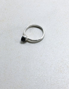 Black onyx bullet band ring