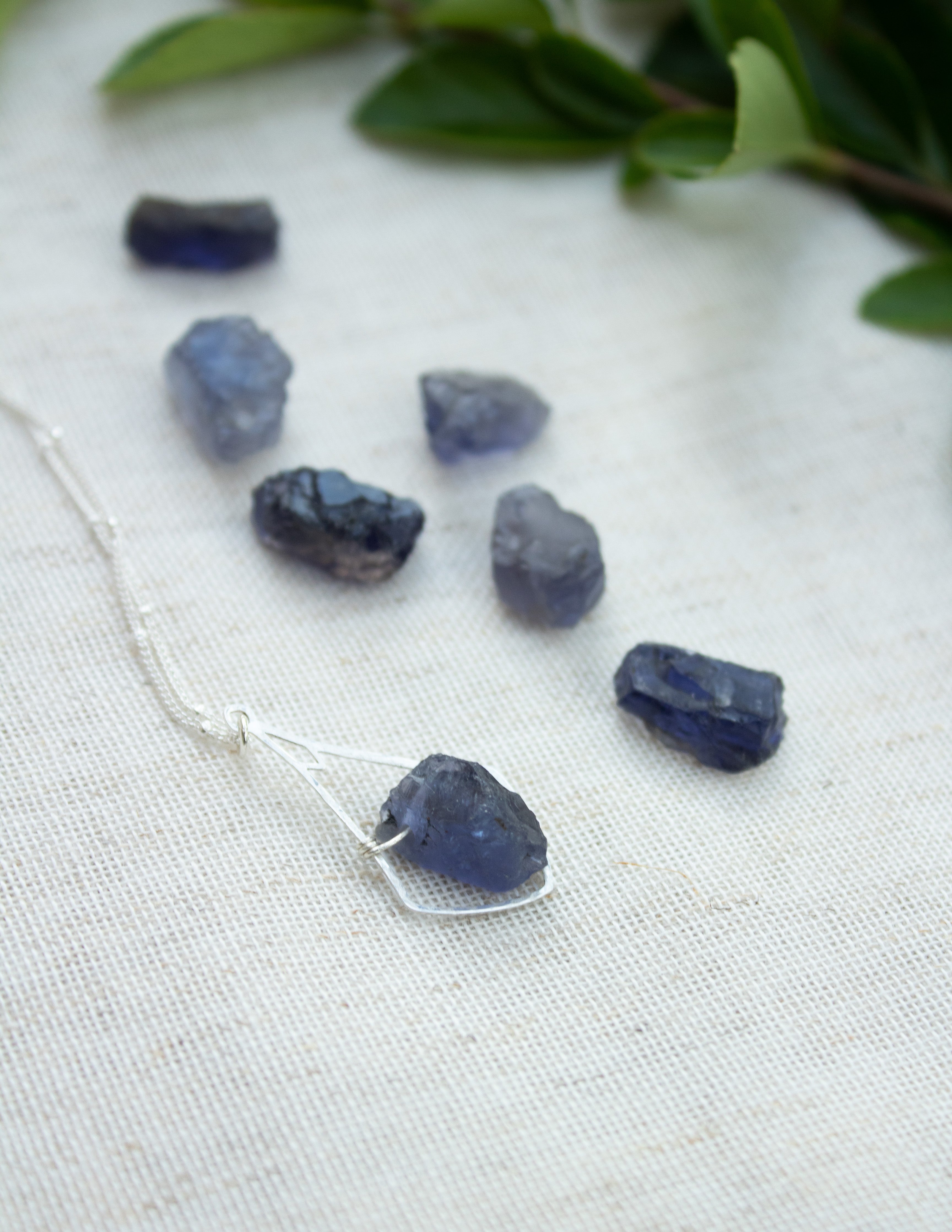 Iolite crystal hammered bell pendant