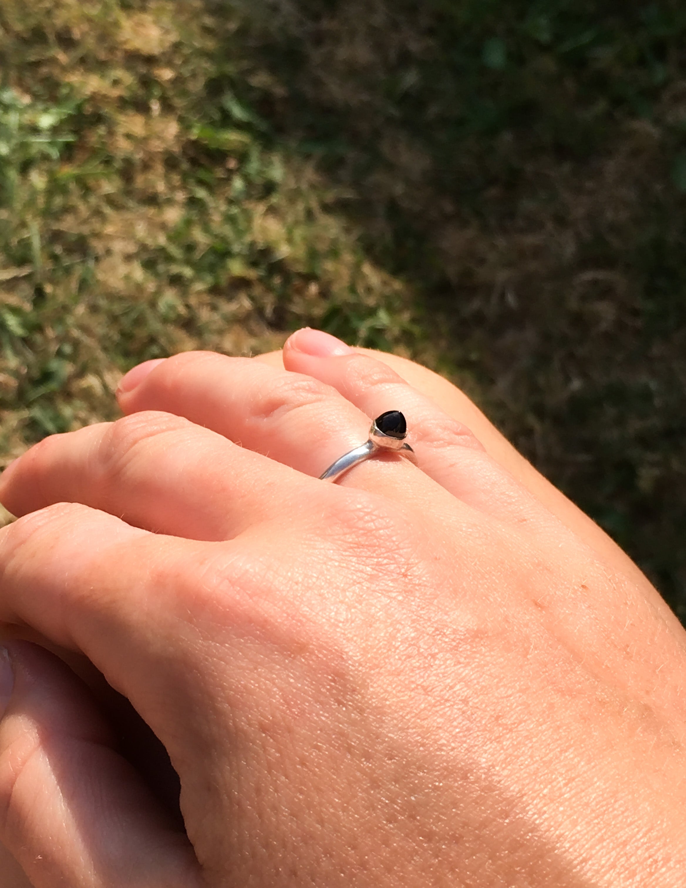 Black onyx bullet band ring